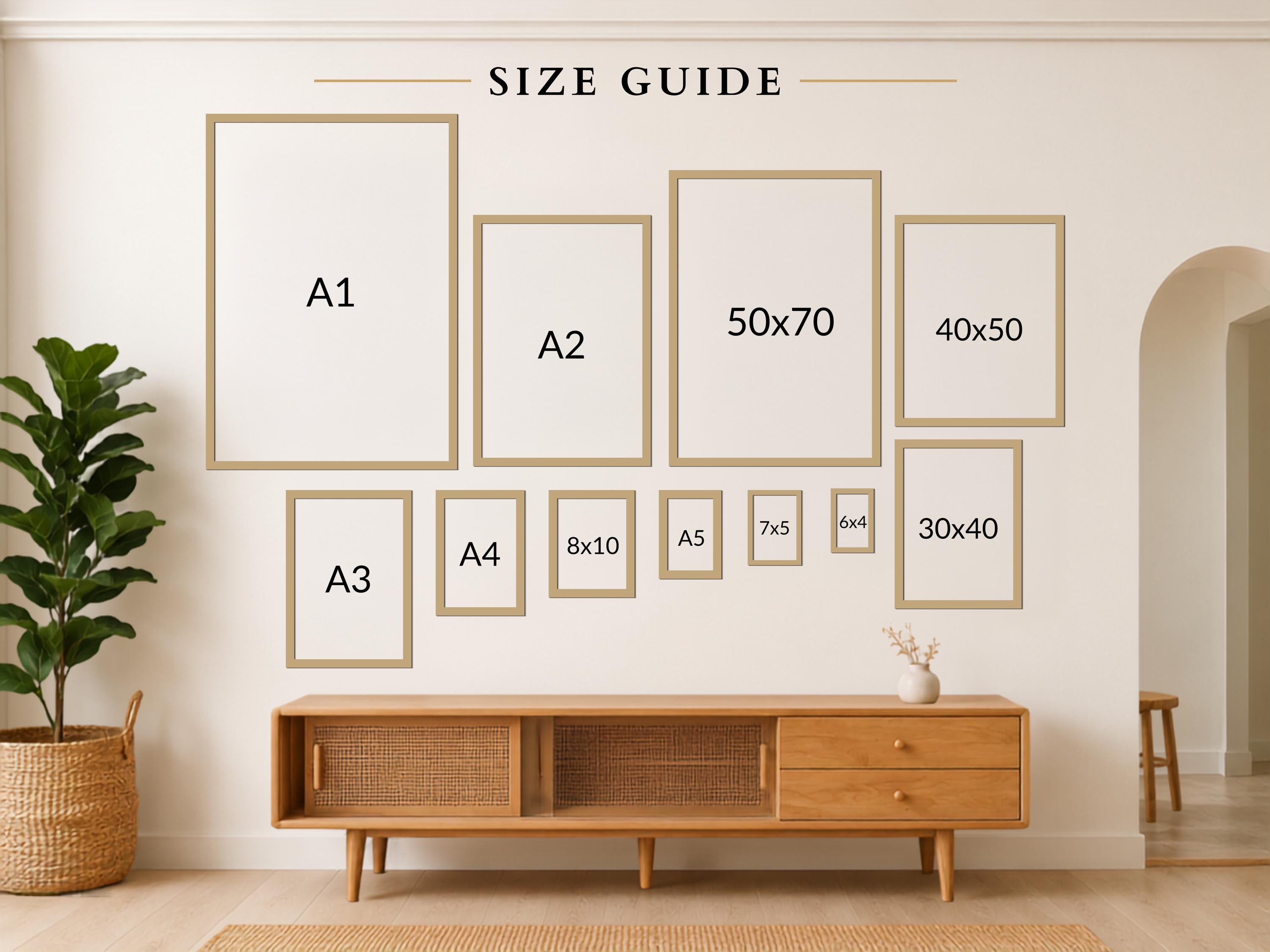 a wall with a series of framed artworks arranged in a grid-like pattern, providing a size guide for the different frame sizes.